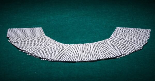 Banner for Stud Poker article showing cards on a playing mat